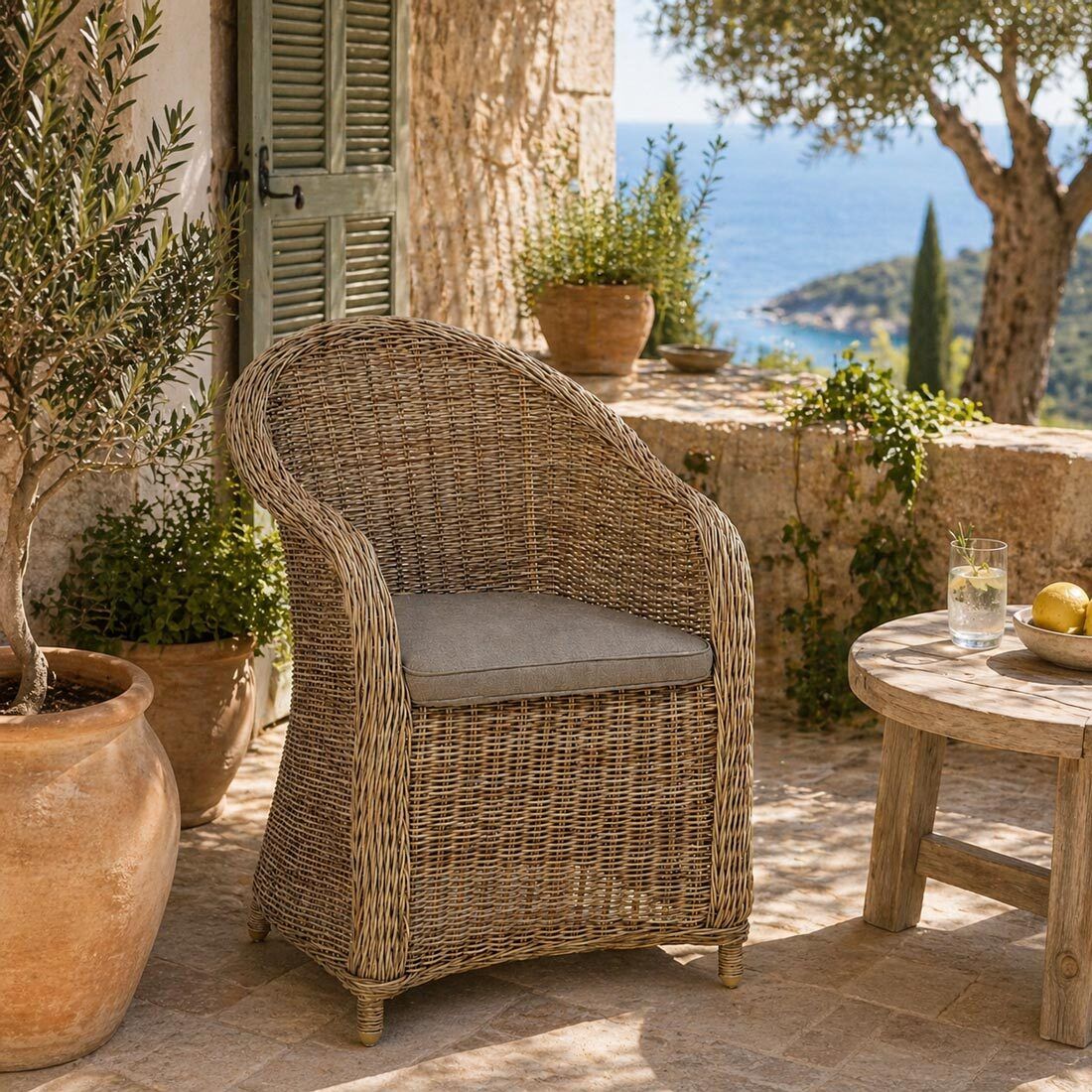 OUTLIV. Coventry Gartensessel Geflecht mit Sitzkissen
